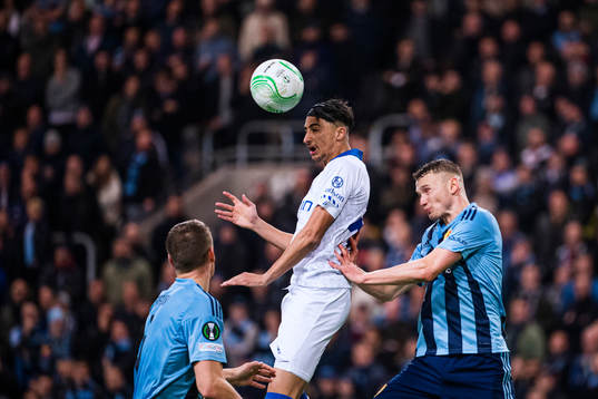 Ibrahim Salah of Gent and Piotr Johansson of Djurgården