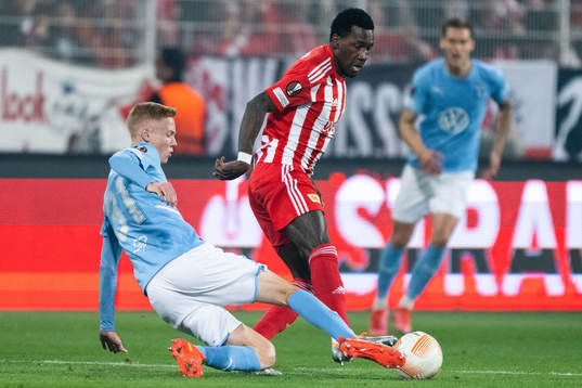 Hugo Larsson of Malmö FF and Sheraldo Becker of Union