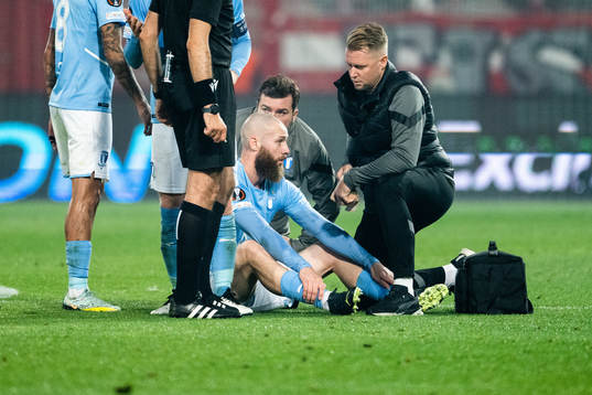 Jo Inge Berget of Malmö FF looks dejected in pain
