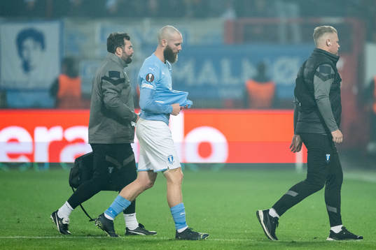 Jo Inge Berget of Malmö FF leaves the pitch due to injury