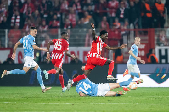 Felix Beijmo of Malmö FF and Sheraldo Becker of Union