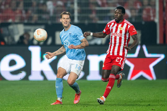 Felix Beijmo of Malmö FF and Sheraldo Becker of Union