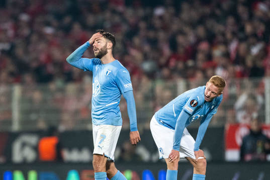 Erdal Rakip and Hugo Larsson of Malmö FF look dejected