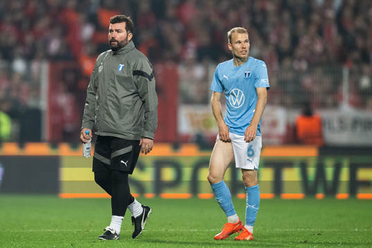 Oscar Lewicki of Malmö FF leaves the pitch due to injury