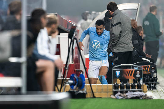 Martin Olsson of Malmö FF leaves the pitch due to injury