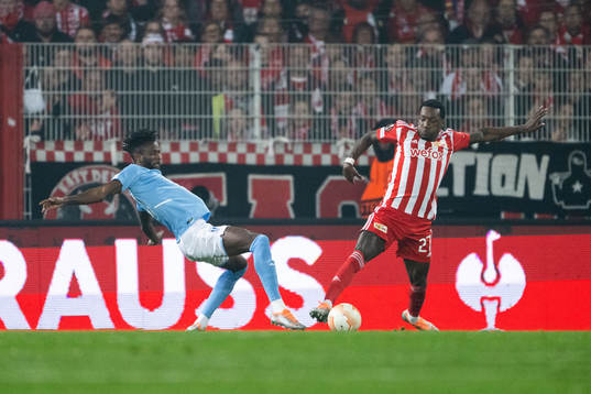 Emmanuel Lomotey of Malmö FF and Sheraldo Becker of Union