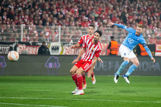 Rani Khedira of Union Berlin and Anders Christiansen of