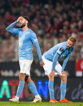 Erdal Rakip and Hugo Larsson of Malmö FF look dejected