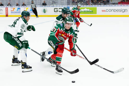 Färjestads Patrik Lundh och Oscar Lawner mot Frölundas