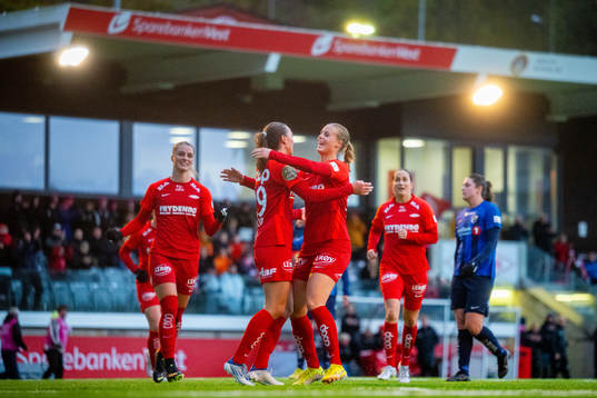 Marit Bratberg Lund of Brann celebrates with teammate Nora