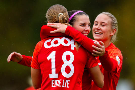 Cecilie Redisch Kvamme of Brann celebrates with teammates
