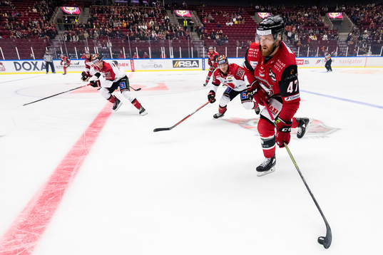 Malmö Redhawks Joakim Ryan och Örebros Petrus Palmu