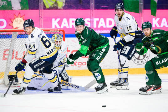 HV71s Eric Martinsson och målvakt Joni Ortio och Sam