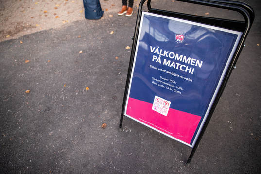 A sign welcoming people to the UEFA Women's Champions