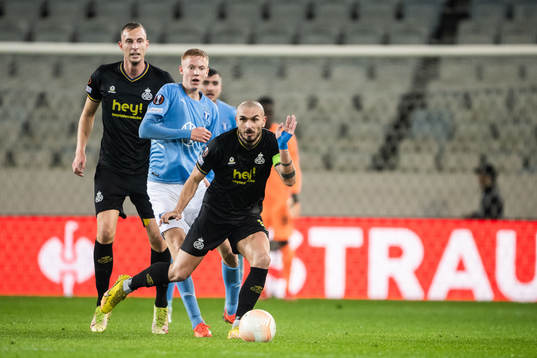 Gustaf Nilsson and Teddy Teuma of Union SG against Hugo