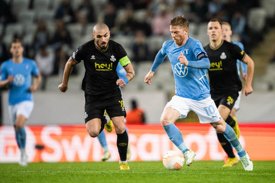 Anders Christiansen of Malmö and Teddy Teuma of Union SG