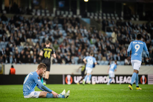 Anders Christiansen looks dejected