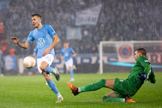 Patriot Sejdiu of Malmö and goalkeeper Anthony Moris of