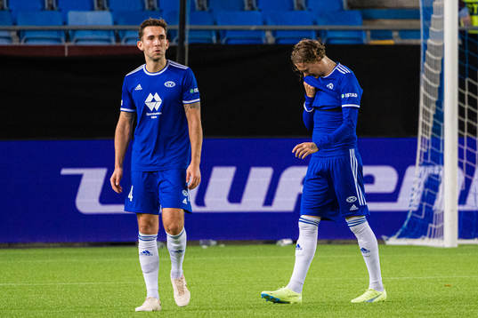 Benjamin Tiedemann Hansen and Birk Risa of Molde looks
