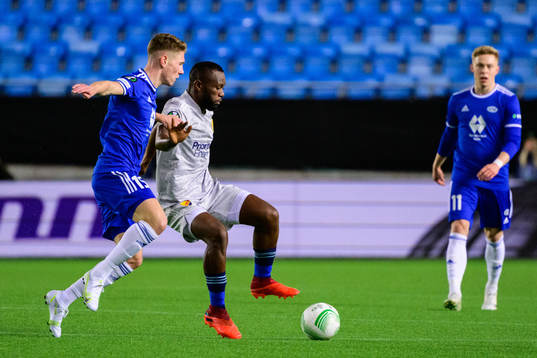 Markus André Kaasa of Molde and Emmanuel Banda of