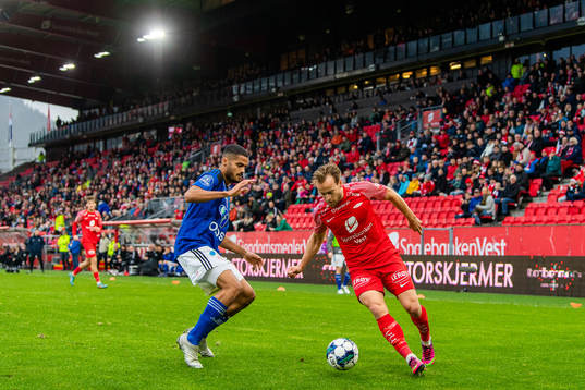 Aaron Kiil Olsen of KFUM and Bård Finne of Brann