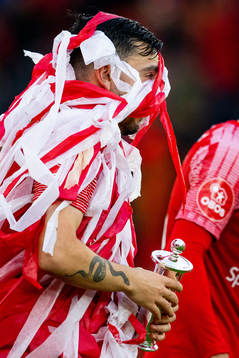 Niklas Castro of Brann with the trophy