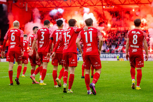 Bård Finne of Brann celebrates with Kasper Skaanes and