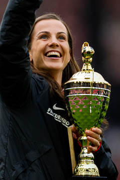 Tuva Hansen of Brann celebrates with the trophy at half-time