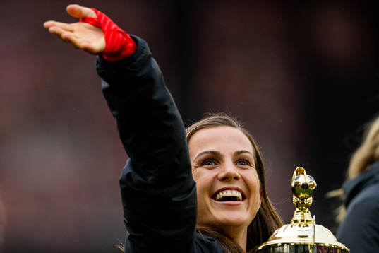 Tuva Hansen of Brann celebrates with the trophy at half-time
