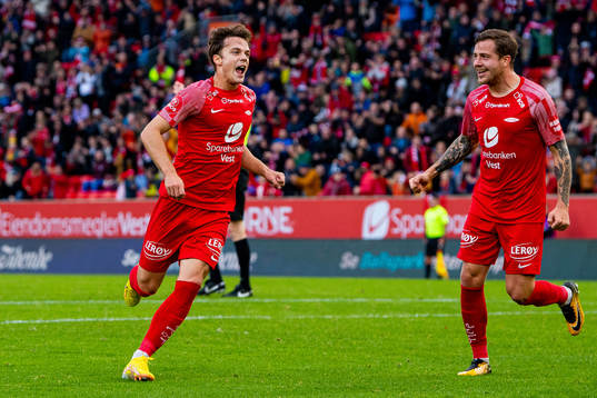 Felix Horn Myhre of Brann celebrates with teammate Frederik