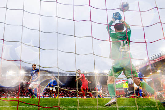 Niklas Castro of Brann scores the 3-1 goal past goalkeeper