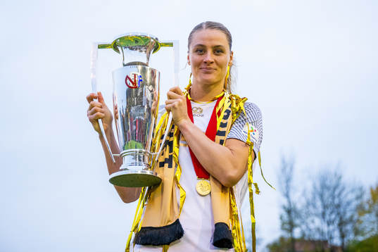 Svava Ros Gudmundsdottir of Brann celebrates with the trophy
