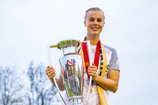 Nora Eide Lie of Brann celebrates with the trophy