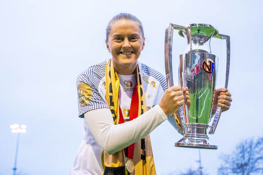 Maria Dybwad Brochmann of Brann celebrates with the trophy