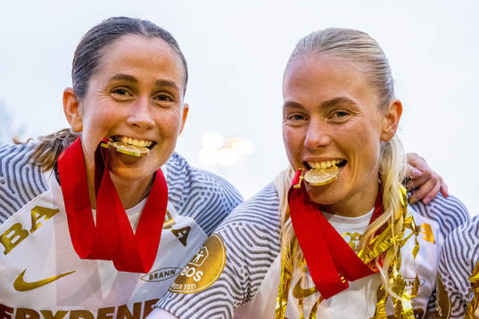 Ingrid Ryland and Guro Bergsvand of Brann celebrate