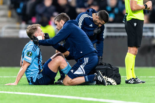 Rasmus Schuller of Djurgården receives medical care
