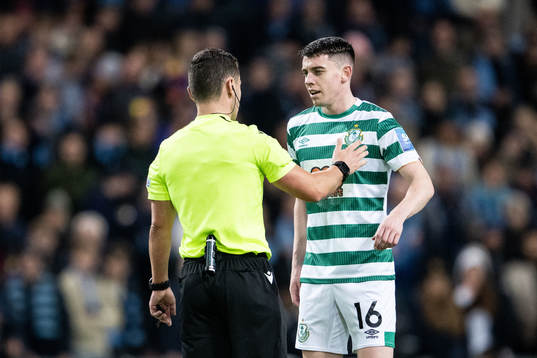 Gary O Neill of Shamrock Rovers in discussion with Referee