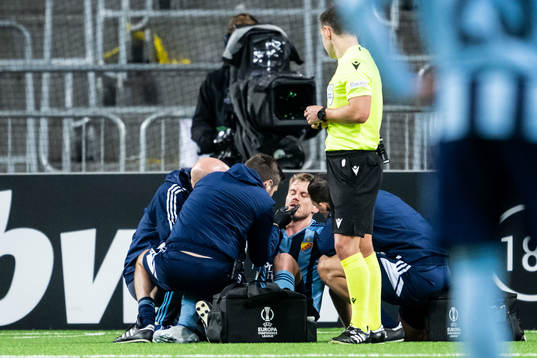 Rasmus Schuller of Djurgården receives medical attention