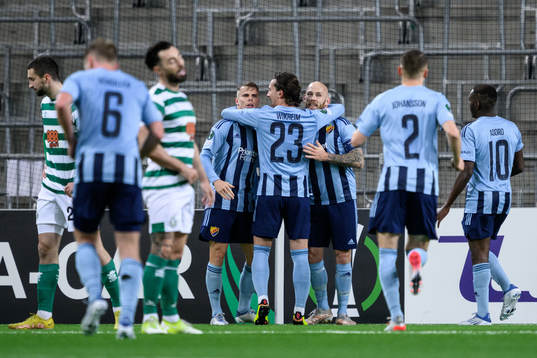 Magnus Eriksson of Djurgården celebrate with teammates