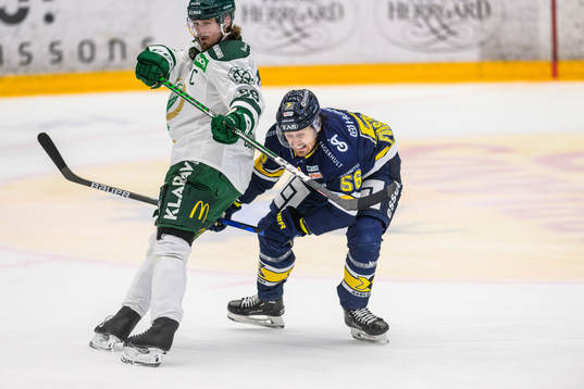 Färjestads Linus Johansson och HV71s Fredrik Forsberg