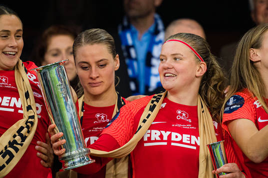Signe Gaupset of Brann celebrates with the trophy