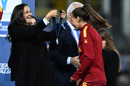 Players of Roma celebrate