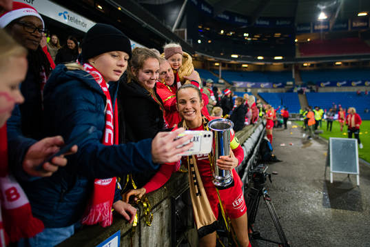 Tuva Hansen of Brann celebrates with the trophy