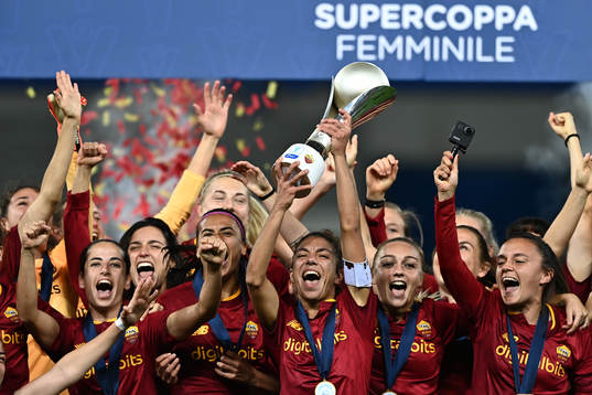 Players of Roma celebrate
