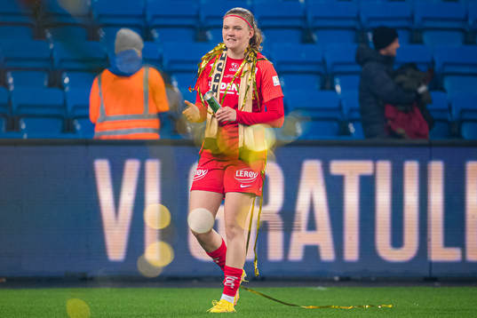Signe Gaupset of Brann celebrates with the trophy