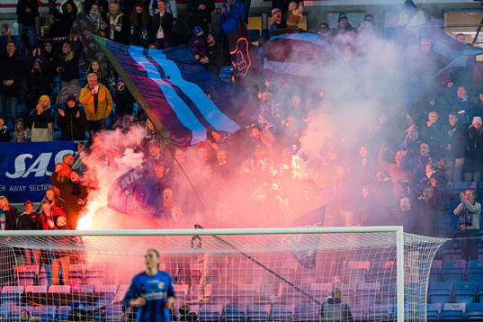 Spectators in the stands celebrates