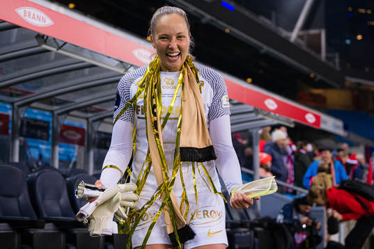Aurora Mikalsen of Brann celebrates with the trophy