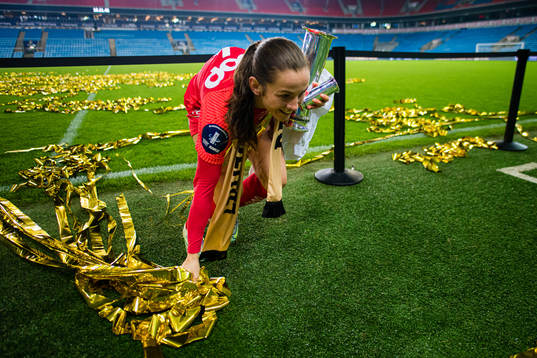 Tuva Hansen of Brann celebrates with the trophy