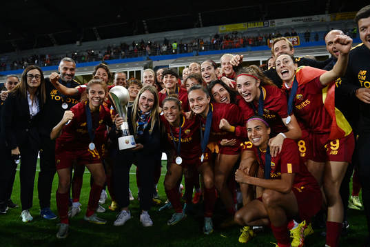 Players of Roma celebrate