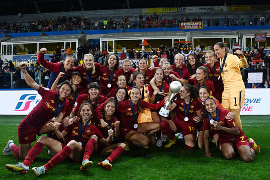 Players of Roma celebrate